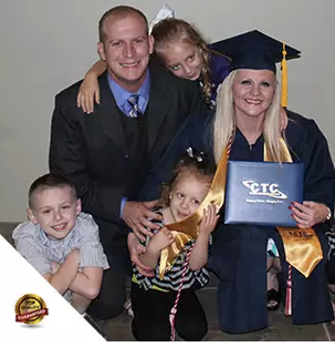 graduated woman with her family