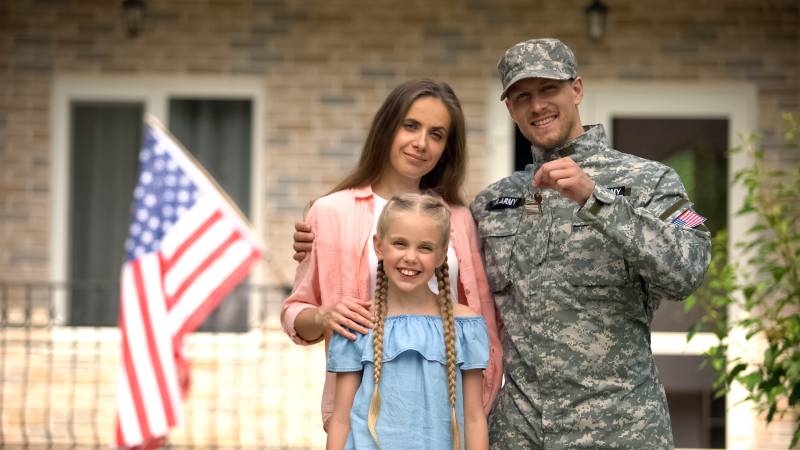 Military man with key to new home